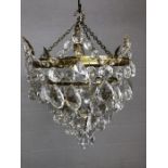 Four tier pendant light with glass drops, approx 29cm in diameter and with a 23cm drop
