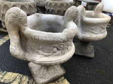 Two swan neck garden planters