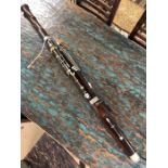 Vintage bassoon with crook and faintly stamped 'Excelsior Class' '8 Leicester Square, London'