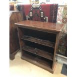 Dark wood shelving unit with two shelves, approx 78cm x 33cm x 84cm tall