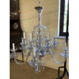 Mid century twelve arm chandelier with glass drops, approx height 105cm and diameter 90cm (A/F)