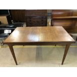 Mid century extending teak dining table with tapered legs, approx 190cm x 89cm fully extended and