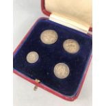 Coins: Four pieces of George V Maundy Money, 1931, 4d. to 1d.. in original red box with blue