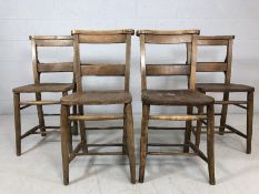 Four vintage elm chapel chairs with prayer book holders