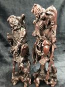 Two antique carved Chinese wooden figures, one A/F, the first approx 34cm tall, the second approx