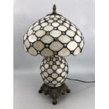 Tiffany style lamp with clear and translucent glass panels and pebbles approx. 50cm tall
