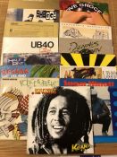 15 Reggae LPs/12" including records by Bob Marley, UB40, Sugar Minott, Dennis Brown, Gladstone