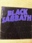 Black Sabbath "Master Of Reality" LP on the Vertigo "swirl" label 6360 050. Comes with the Vertigo