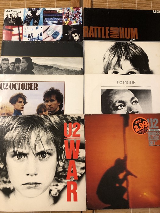 8 U2 LPs/12" including "Achtung Baby", "Boy", "War", "October" etc...
