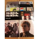 12 Punk & New Wave LPs/12" including albums by New Order, The Stranglers, Siouxsie & The Banshees
