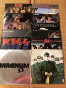 12 Hard Rock & Heavy Metal LPs/12" including records by AC/DC (x3), Magnum, Scorpions, Kiss,