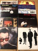 12 Punk & New Wave LPs/12" including records by The Stranglers, Siouxsie & The Banshees, The Jam,