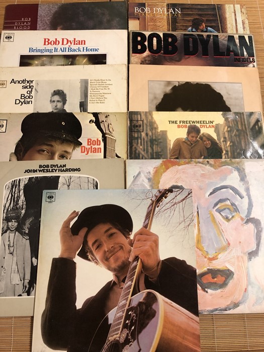 11 Bob Dylan LPs including "Blood On The Tracks", "Bringing It All Back Home", "The Freewheelin", "