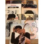 11 Bob Dylan LPs including "Blood On The Tracks", "Bringing It All Back Home", "The Freewheelin", "