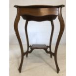 Occasional table with shaped top, cabriole legs and small shelf under, approx 50cm x 50cm x 70cm