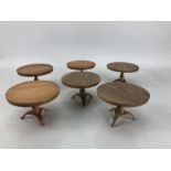 Six circular wooden dolls house tables, approx 9.5cm in diameter and 6cm in height
