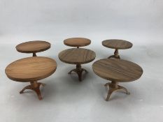 Six circular wooden dolls house tables, approx 9.5cm in diameter and 6cm in height