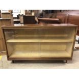Mid century display cabinet with sliding glass doors, approx 122cm x 30cm x 76cm tall