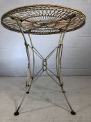 Ornate circular metal garden table, diameter approx 76cm