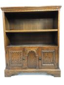 Freestanding bookshelf with two cupboards under, approx 84cm x 26cm x 103cm tall