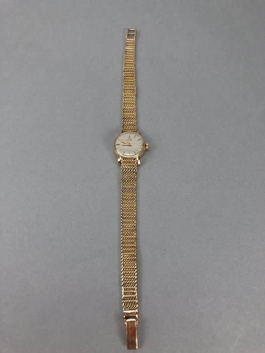 Ladies 9ct Gold OMEGA wristwatch with silver coloured dial and 9ct 375 strap (total weight 23.4g) - Image 5 of 9