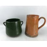 Large vintage ceramic jug, approx 23cm tall and a green vintage ceramic two handled pot, approx 17cm