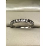 Platinum Half Eternity ring set with Diamonds (one missing) size 'O'