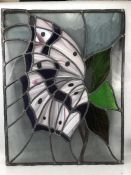 Leaded stained glass panel with butterfly design, approx 70cm x 55cm, sold on behalf of the