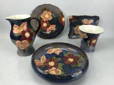 A Royal Doulton Wild Roses series, pattern no. 6227 to include circular bowl 7562, plate, Jug,