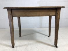 Antique pine small kitchen table on castors, approx 106cm x 59cm x 76cm tall