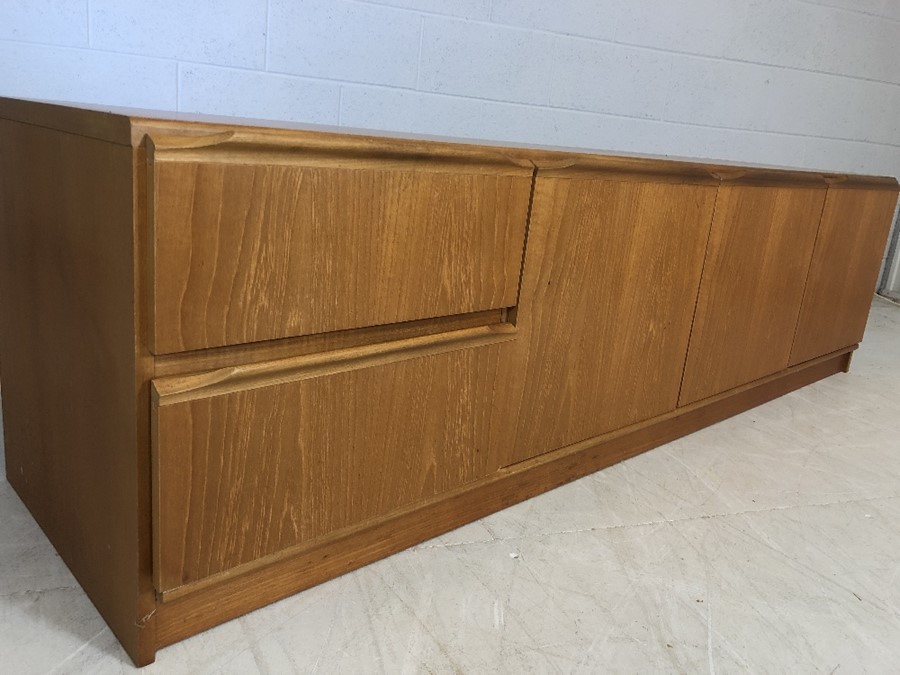 Mid century low sideboard with three door cupboard and two drawers, approx 183cm x 48cm x 50cm tall - Image 3 of 3