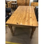 Pine dining table on turned legs, approx 180cm x 90cm