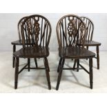 Four wheel back dining chairs