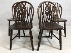 Four wheel back dining chairs