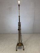 Brass tripod standard lamp with leaf design to base