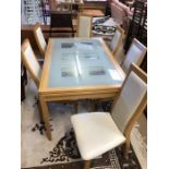 Modern glass-topped extending dining table, approx 220cm x 80cm (fully extended) with six high