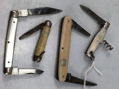 Four vintage folding fruit knives /pen knives