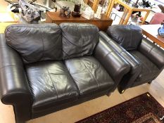 Brown leather two seater sofa and matching armchair