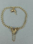 9ct Gold 375 charm bracelet with two charms & 9ct hallmarked Lock approx 3.7g