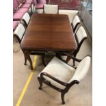 Extending reproduction Mahogany dining table, approx 147cm x 100cm extended, with six upholstered