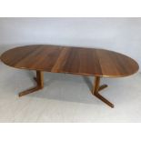 Danish Mid Century extending dining table in Cherrywood by Gudme Mobelfabrik, with two leaves.