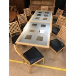 Modern extending glass-topped dining table (approx 245cm x 90cm fully extended) with eight lattice-