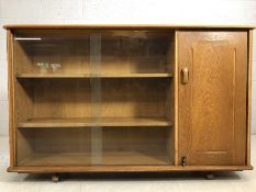 Vintage mid-century sideboard with three glass fronted shelves and cupboard, on castors, approx