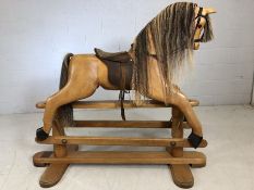 Large wooden rocking horse by Horseplay of Broadhempston, Devon, with real horse hair mane, forelock