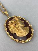 Large 9ct Gold Cameo Brooch on 9ct gold chain, the cameo head is marked 375, as is the mount...Gross