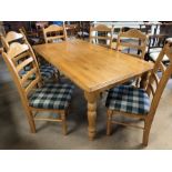 Polished pine kitchen/dining table approx 180cm x 100cm, with six matching chairs with upholstered