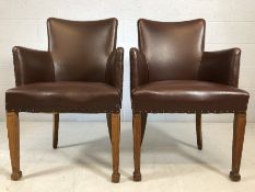 Pair of brown leather upholstered chairs with stud detailing, approx height at back 90cm and width