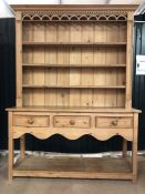 Antique pine dresser with carved detailing, with three drawers under. Approx 152cms x 45cms x 210cms