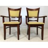 Pair of modern carver chairs with upholstered seats and backs