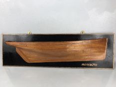 Half block model of the 'Mosquito' 1848 racing cutter. Inscribed verso. Approx 87cm in length
